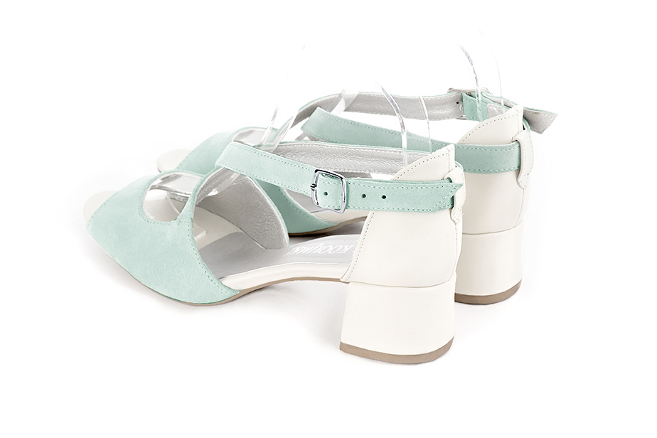 Women's aquamarine blue and off white elegant sandals closed at the back with crossed straps. Round toe. Low flare heels - Rear view
